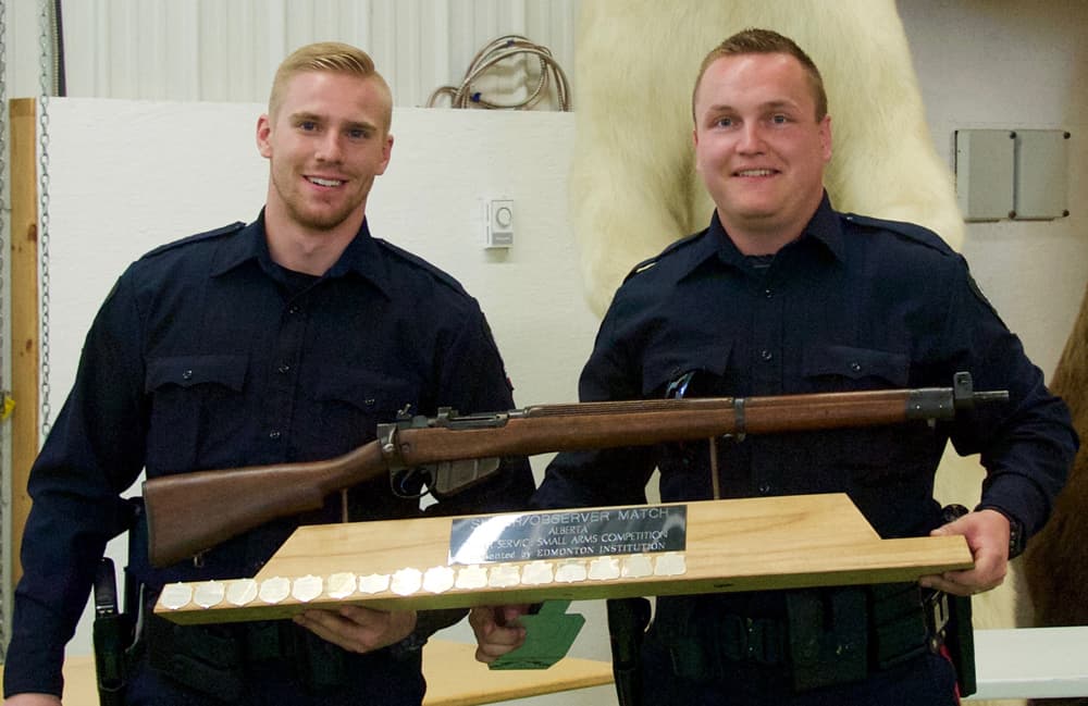 James Creaser and his partner with the Sniper/Observer Match trophy at the Inter-Service Small Arms Competition in Alberta